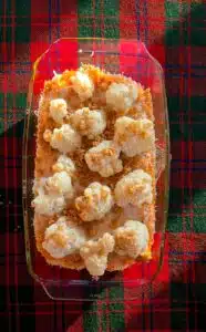 gegratineerde bloemkool met zoete aardappelen uit de oven